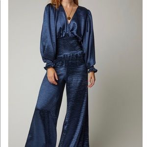 CAROLINE CONSTAS
Smocked satin wide-leg jump